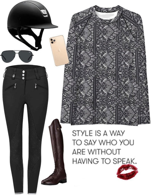 Chantilly Lace Sunshirt paired with black riding breeches, tall riding boots and a Charles Owens riding helmet.